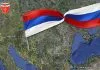 русија